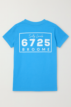 Back view of 6725 Logo Kids Tee in vibrant ocean-blue with 'Salty Locals 6725 BROOME' print.