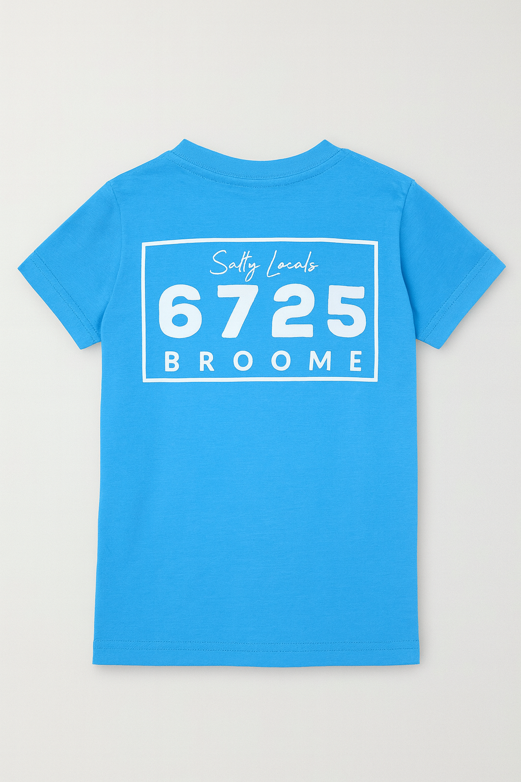 Back view of 6725 Logo Kids Tee in vibrant ocean-blue with 'Salty Locals 6725 BROOME' print.